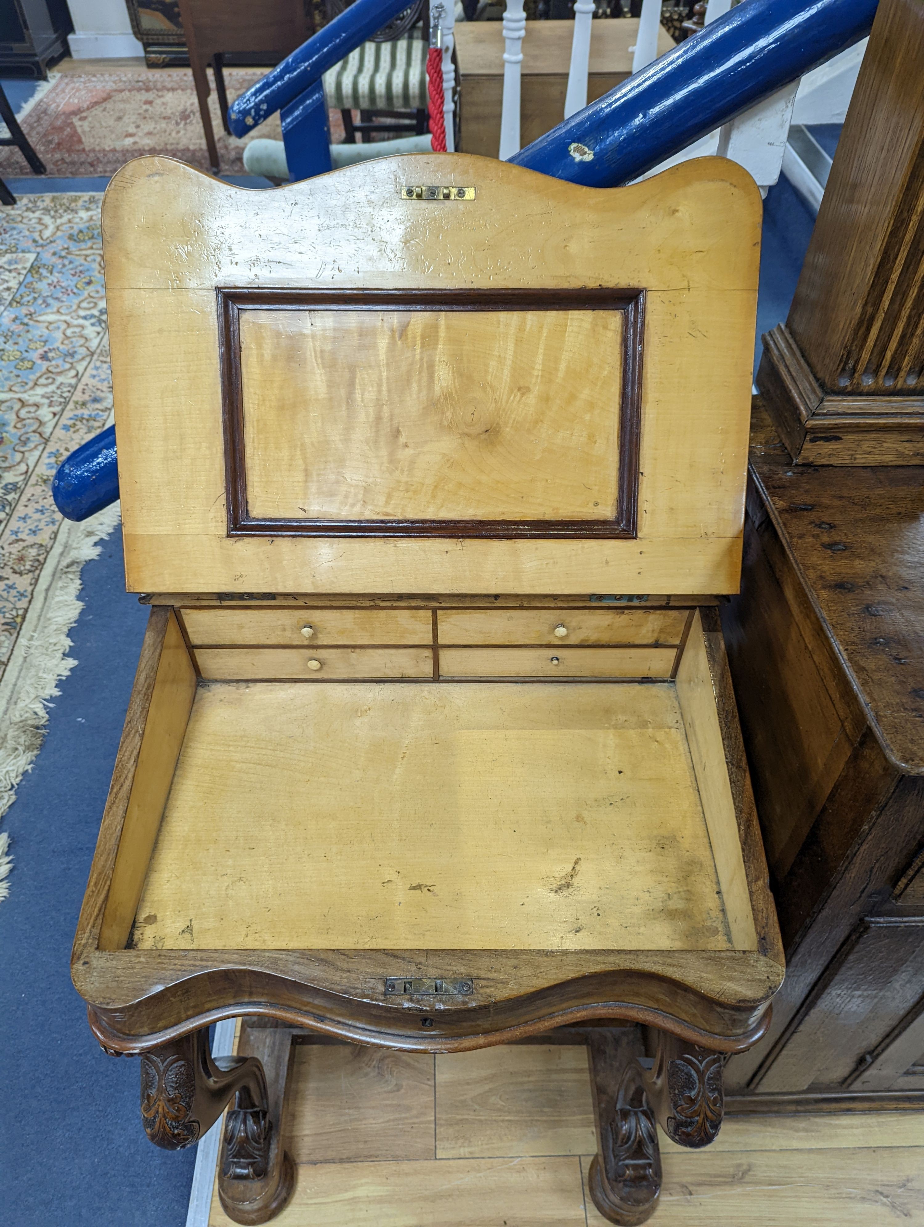 A Victorian walnut Serpentine fronted Davenport, width 55cm